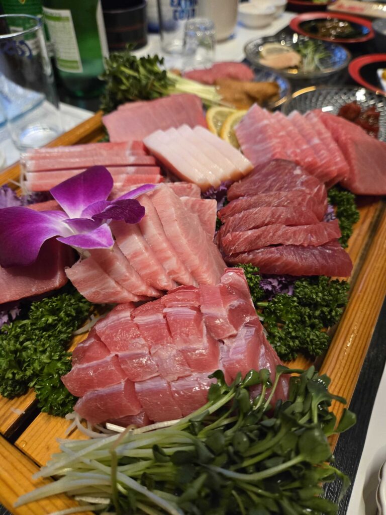 otoro tuna sashimi close-up marbling fat texture raw fish