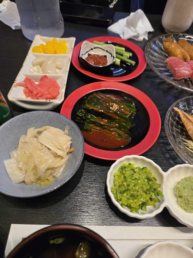 Seongsoo Jeong Chamchi banchan spread edamame gari pickled vegetables full table