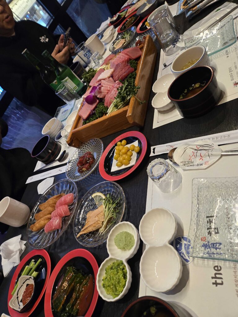 Seongsoo Jeong Chamchi full table spread with tuna platter soju and miso soup