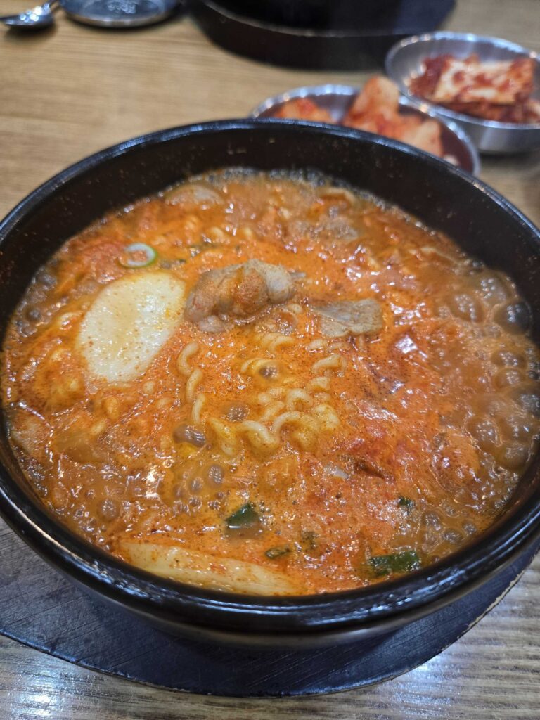 Another angle of the budae suyuk gukbap at Dammion Seongsu with kimchi on the side