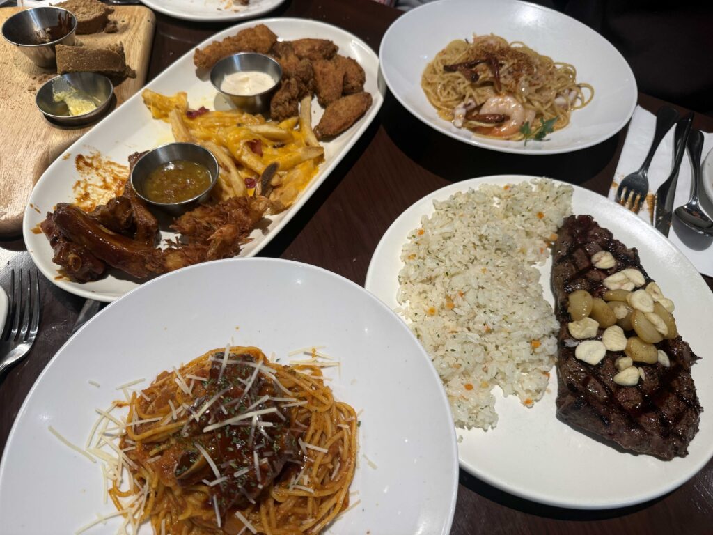 Close-up of perfectly seared garlic rib-eye steak showing juicy texture