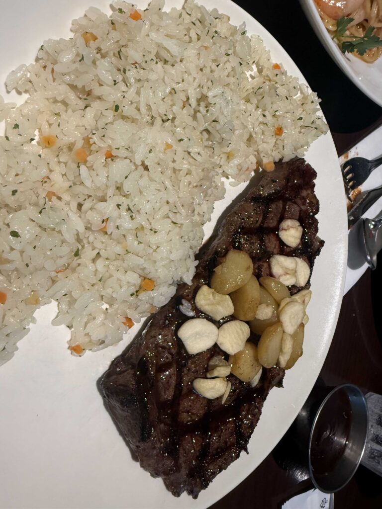 Overhead view of Outback Steakhouse Jamsil dinner plates