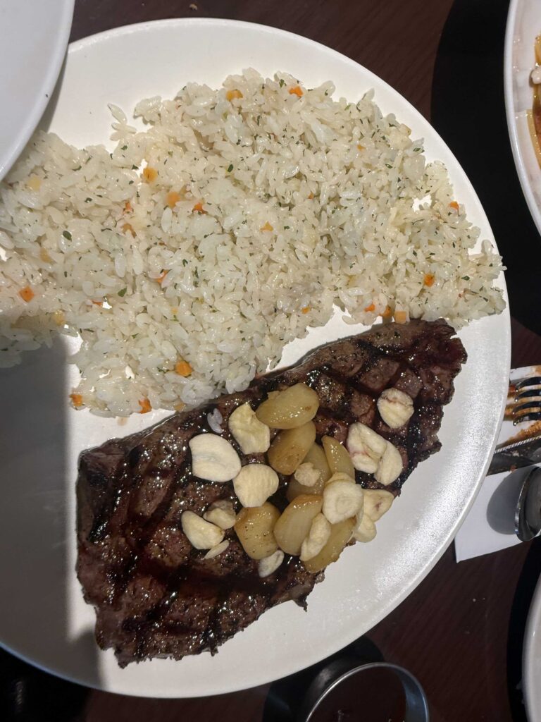 Close-up of multiple dishes at Outback Steakhouse Jamsil