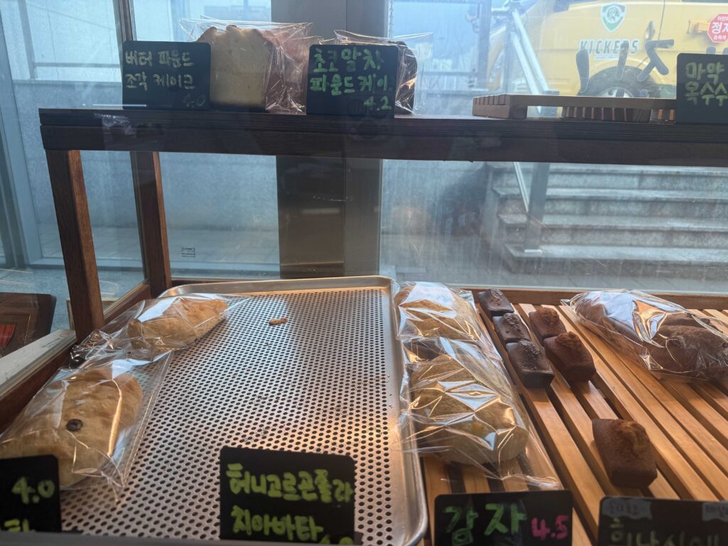 Bread display with pound cakes and ciabatta