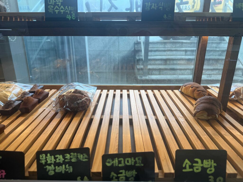 Bakery display showing salt bread and egg mayo bread