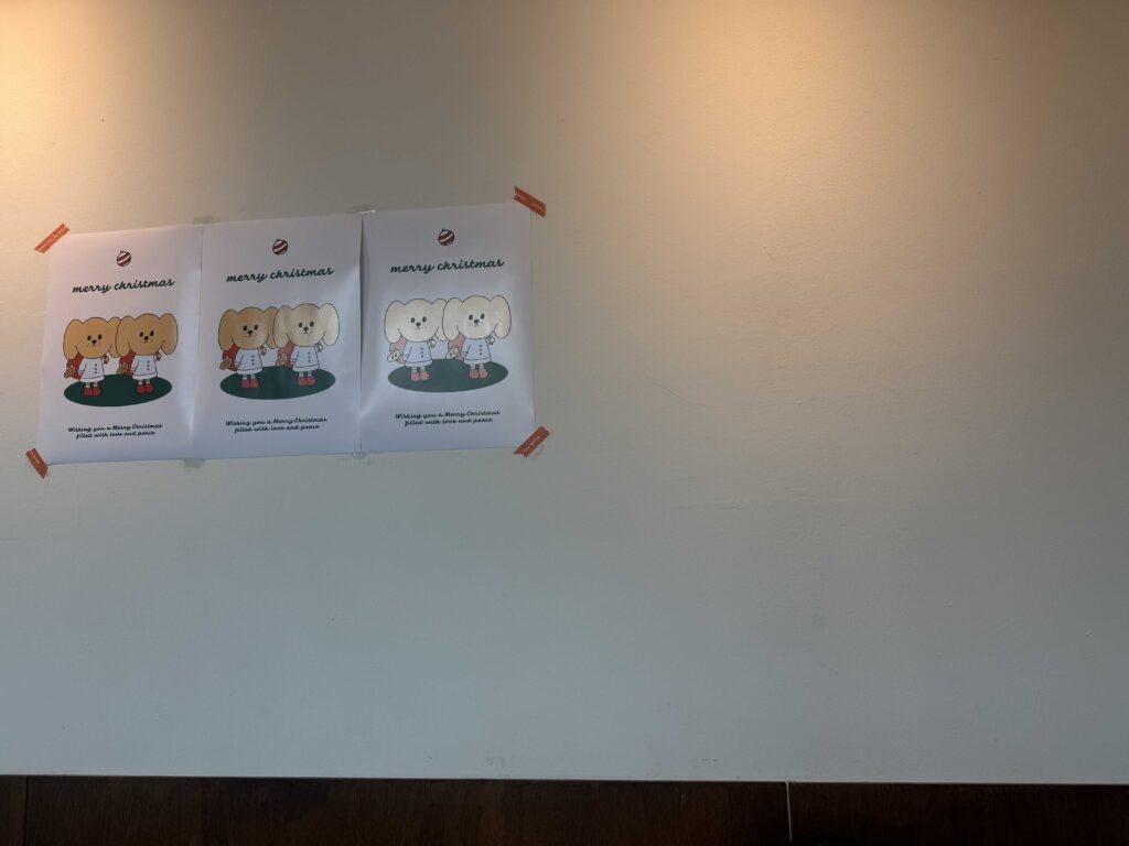 Cute dog mascot Christmas posters on bakery wall