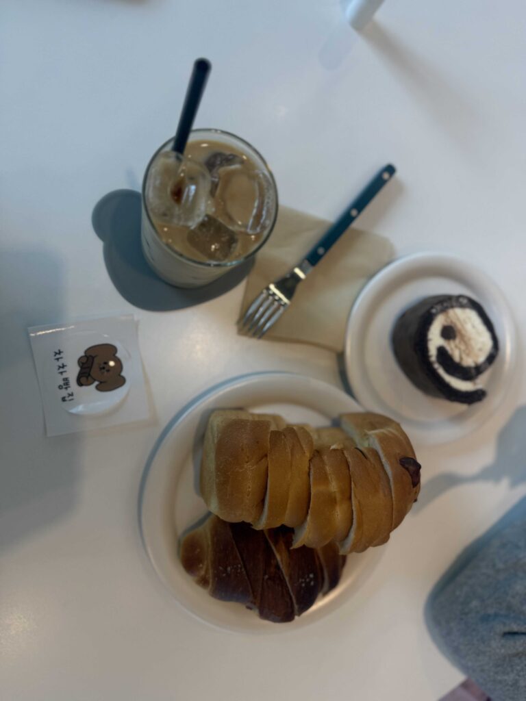 Overhead view of bread and cake at ChaCha Bakery table
