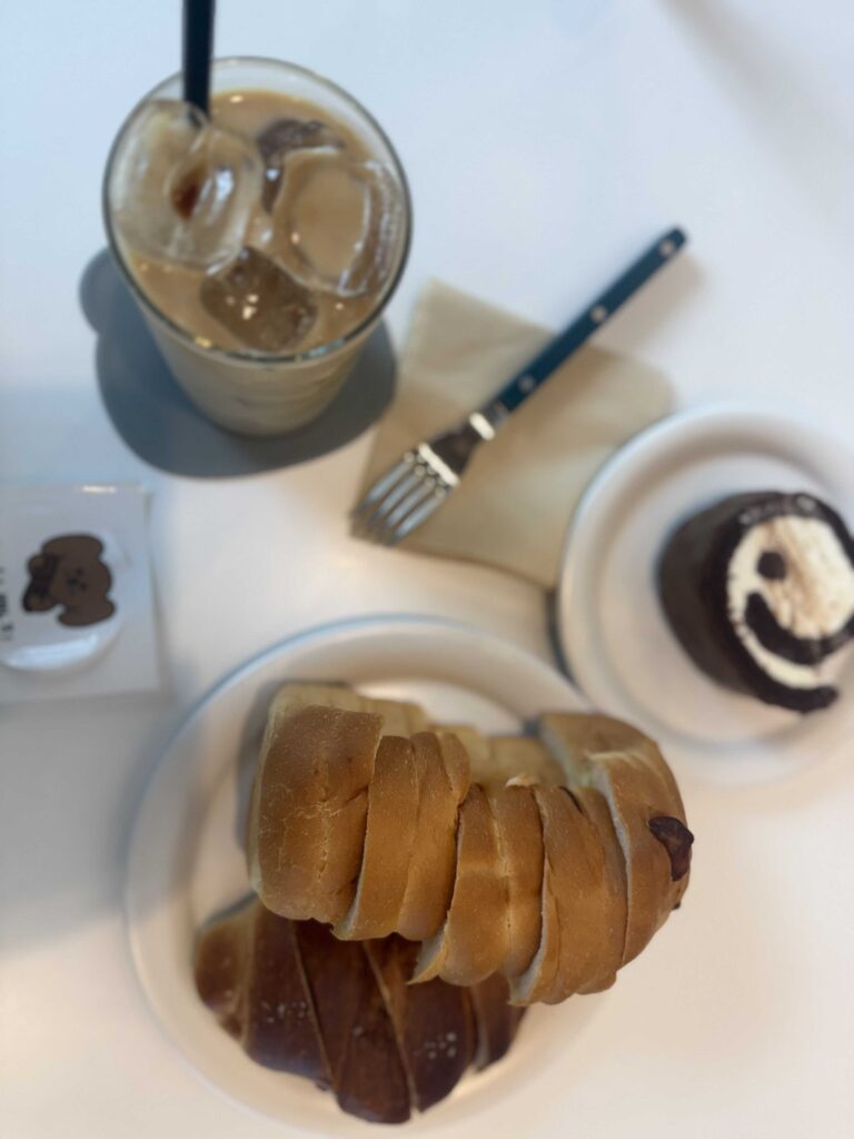 Close up of roll cheese bread and chocolate roll cake