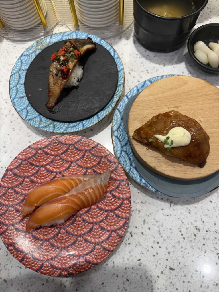 Salmon nigiri grilled fish sushi plates Sushi Ian Wirye 1990 KRW affordable