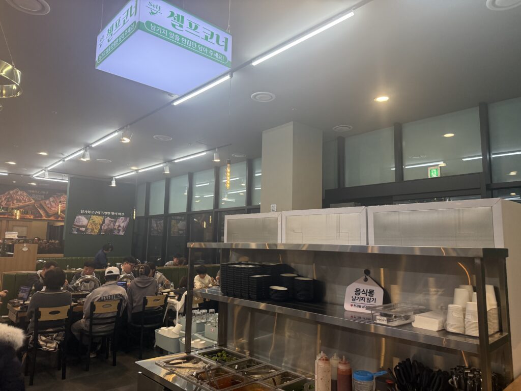 Daepohang harbor night view Sokcho with lights reflecting on water