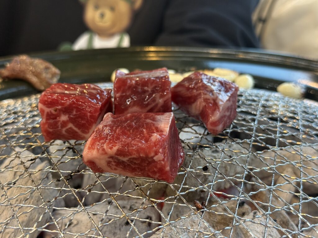 Korean BBQ side dishes banchan spread at Damga Hwaro Grill table