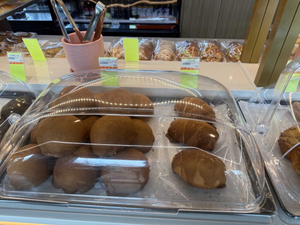 Salt bread and baked goods tray at Ganghyeon Bakery