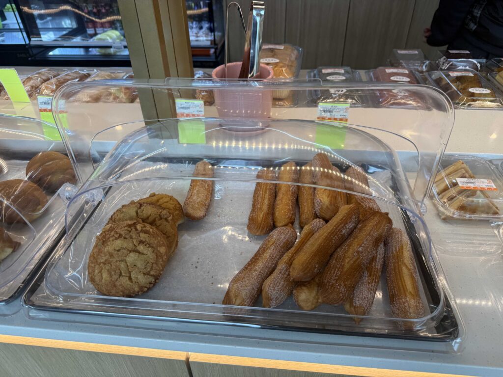 Churro-style pastry and bread selection at Ganghyeon Bakery