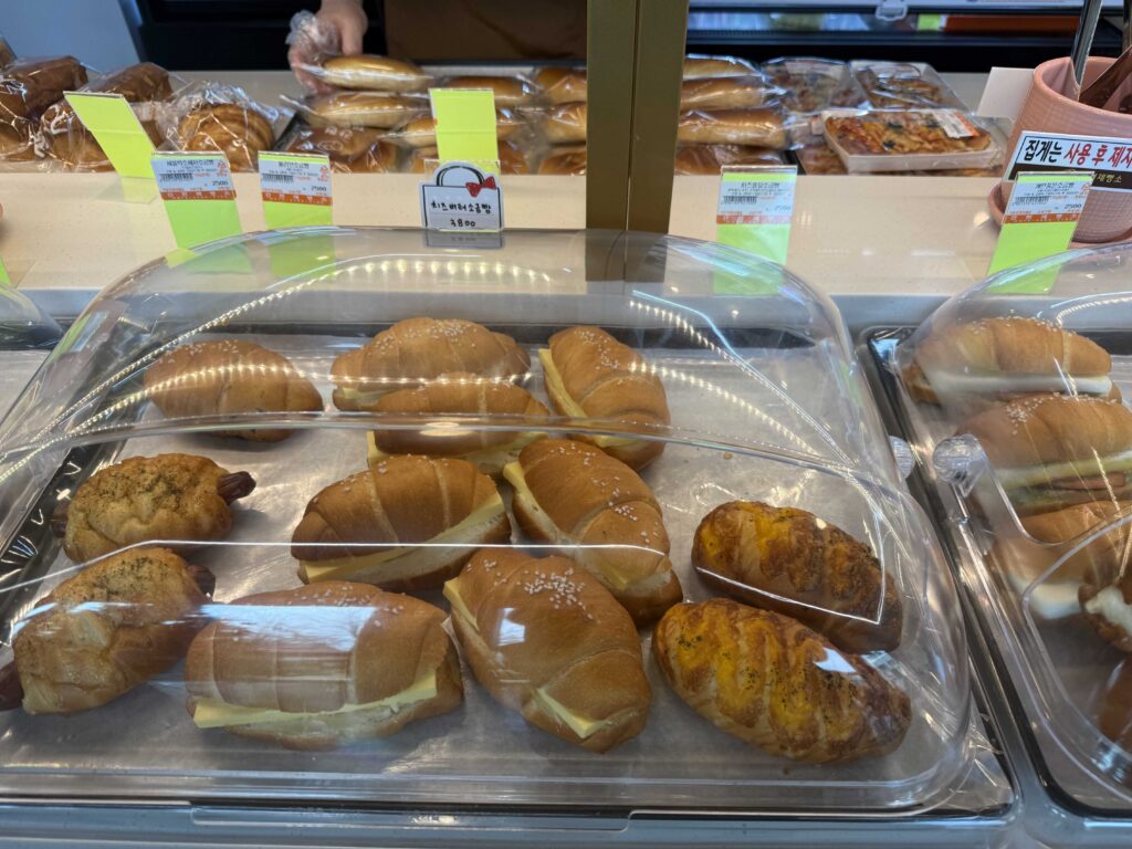 Croissants on display tray at Ganghyeon Bakery Cafe Korea
