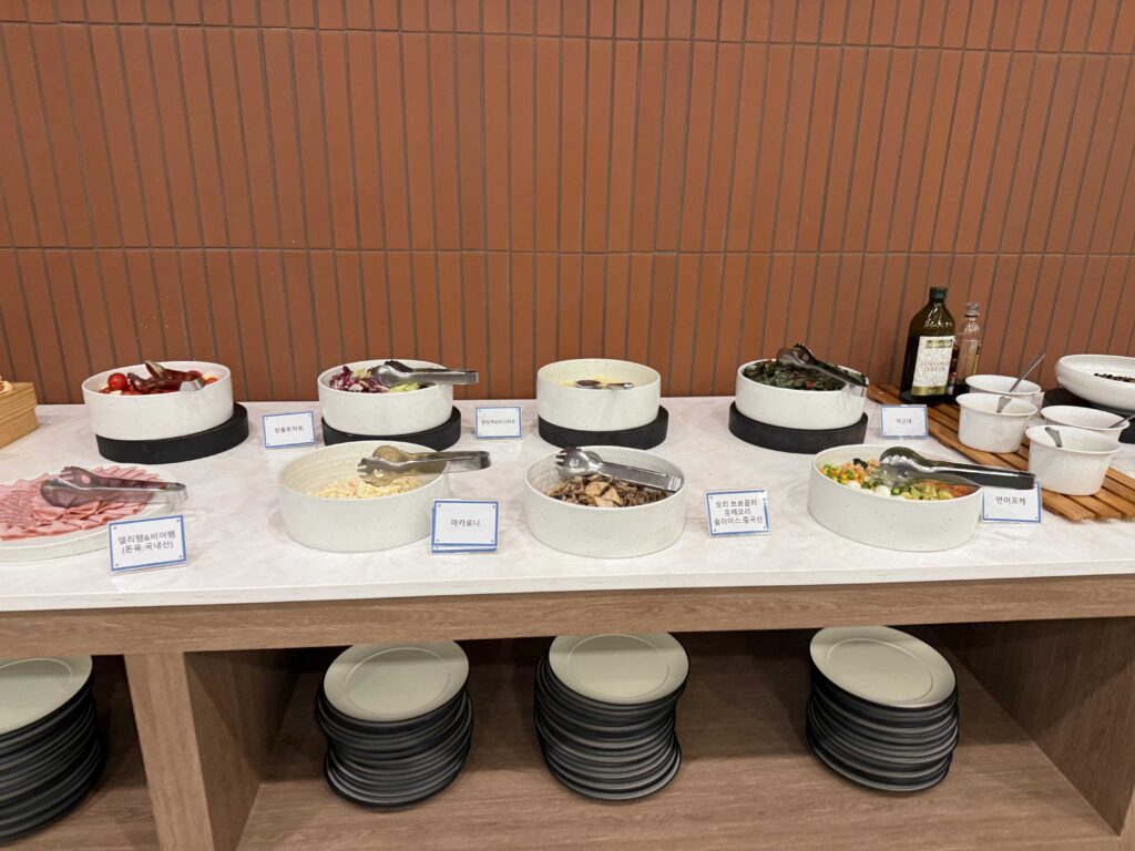 Full banchan spread at Oak Valley Resort breakfast buffet Korean side dishes