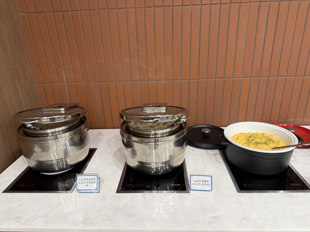 Hot food station eggs sausages at Oak Valley Resort breakfast buffet