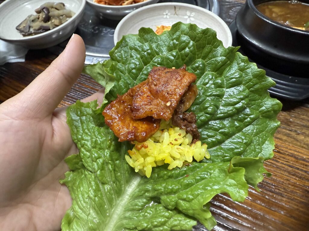 Ssam lettuce wrap with Korean braised pork and rice at Deulkkot Garden Wonju