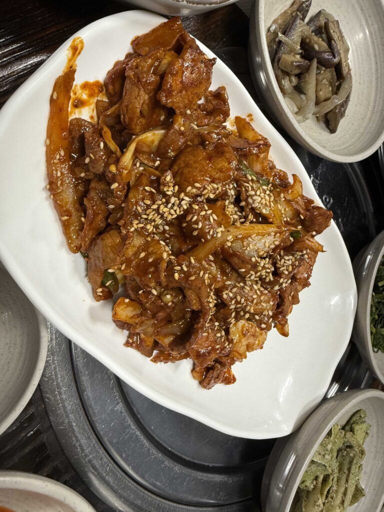 Korean spicy pork stir fry with sesame seeds and scallions Deulkkot Garden