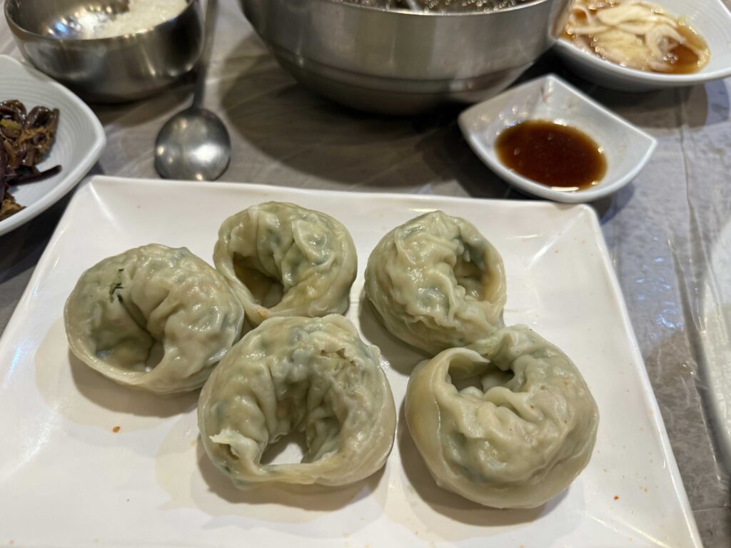 Korean pork belly samgyeopsal with grilled kimchi at Mannajeong restaurant