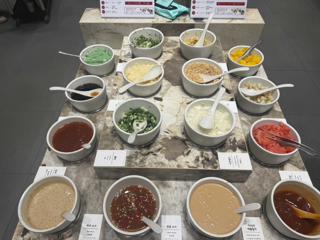 Shabeu 20 interior design wooden beams ink mural Seoul restaurant atmosphere