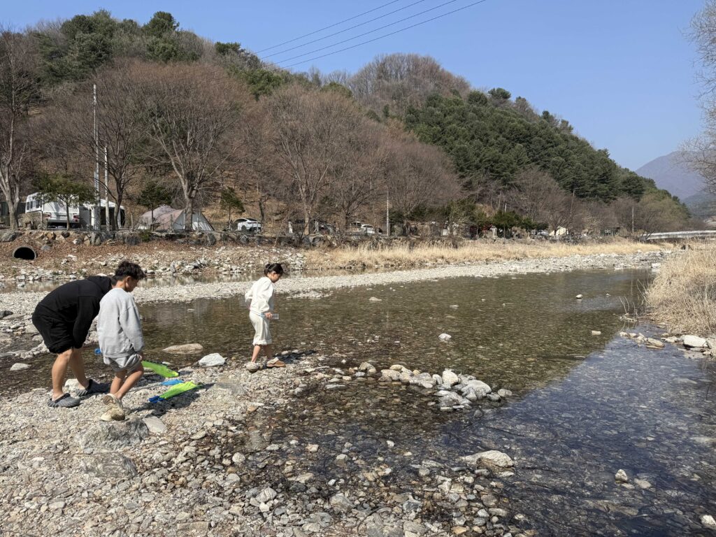 Mulmyeong Camp stream view with mountains in Gapyeong Korea - best kids camping site