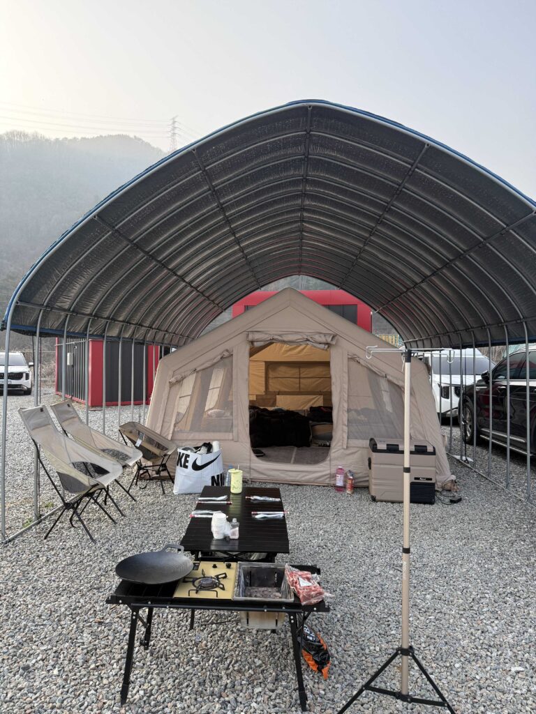 Morning view of the stream and mountains at the campsite