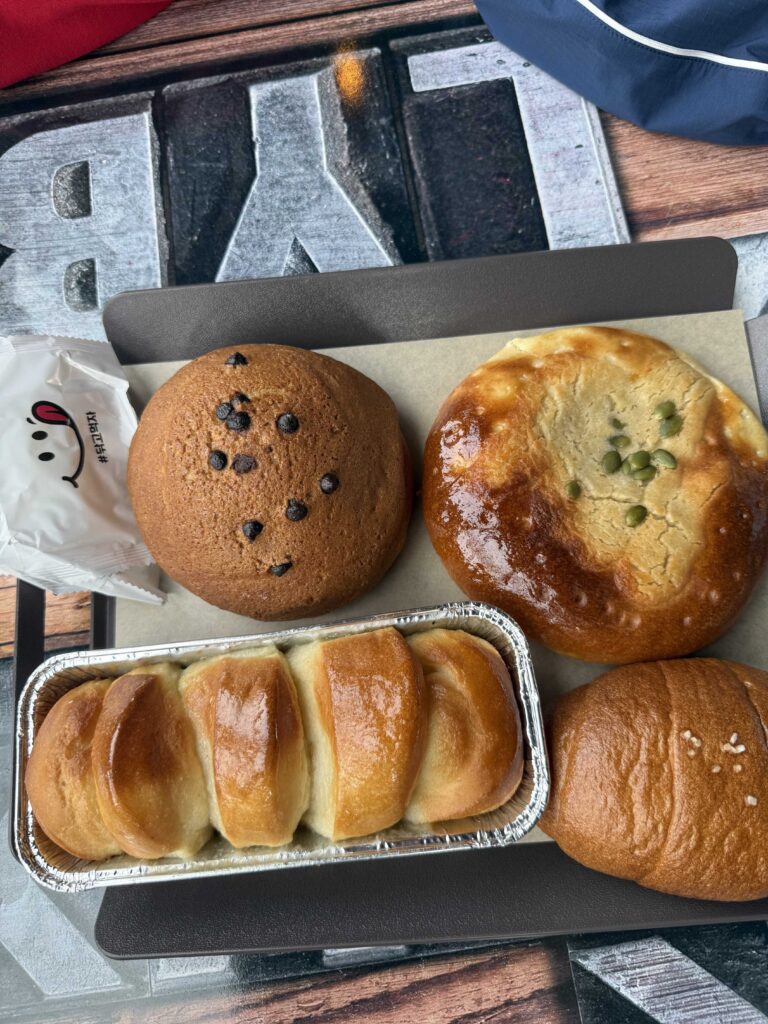 Bread selection including choco chip soboro and green onion cheese bread