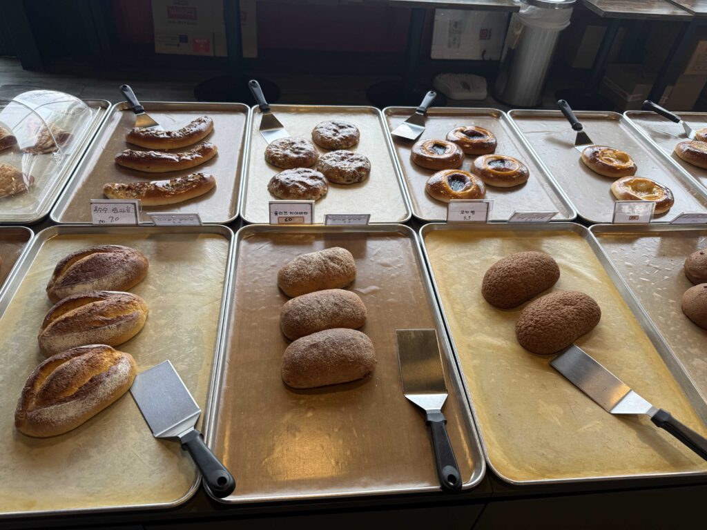 Display of donuts pastries and whole wheat bread at Baegundang Bakery
