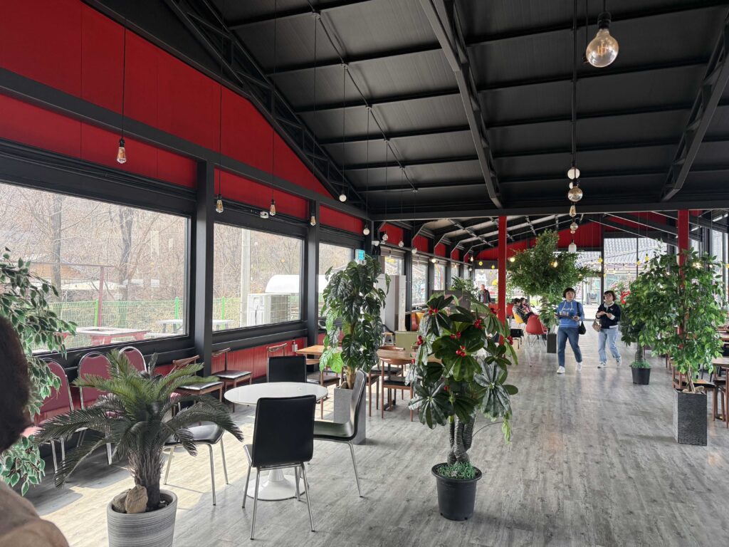 Trays of fresh baked croissants buns and pastries on display