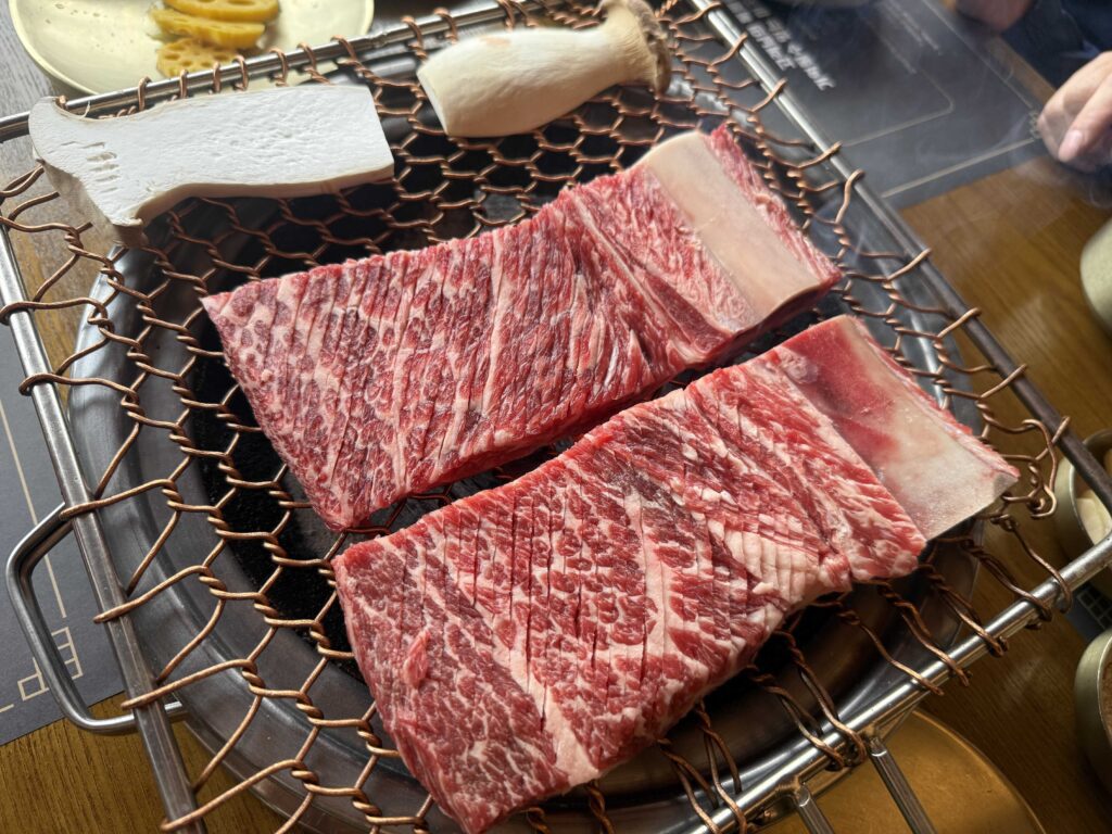 Close-up of premium Korean beef galbi on grill