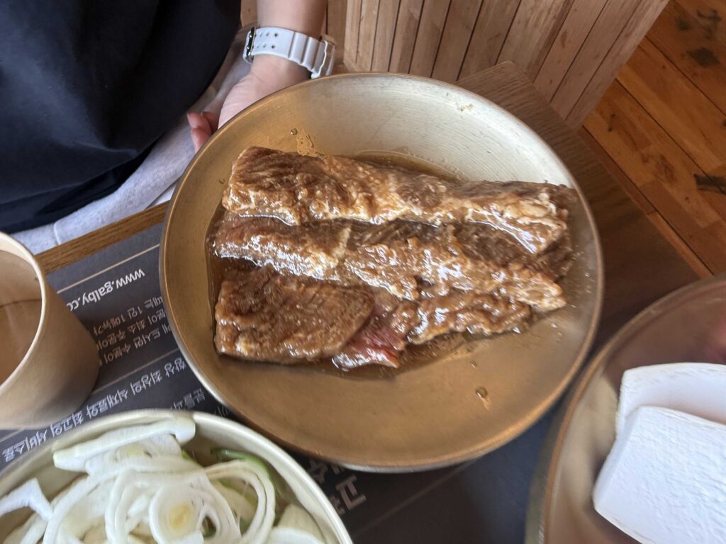 Cooked marinated galbi on a serving plate