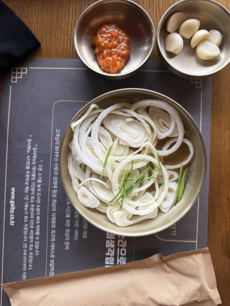 Sliced onions garlic and ssamjang banchan