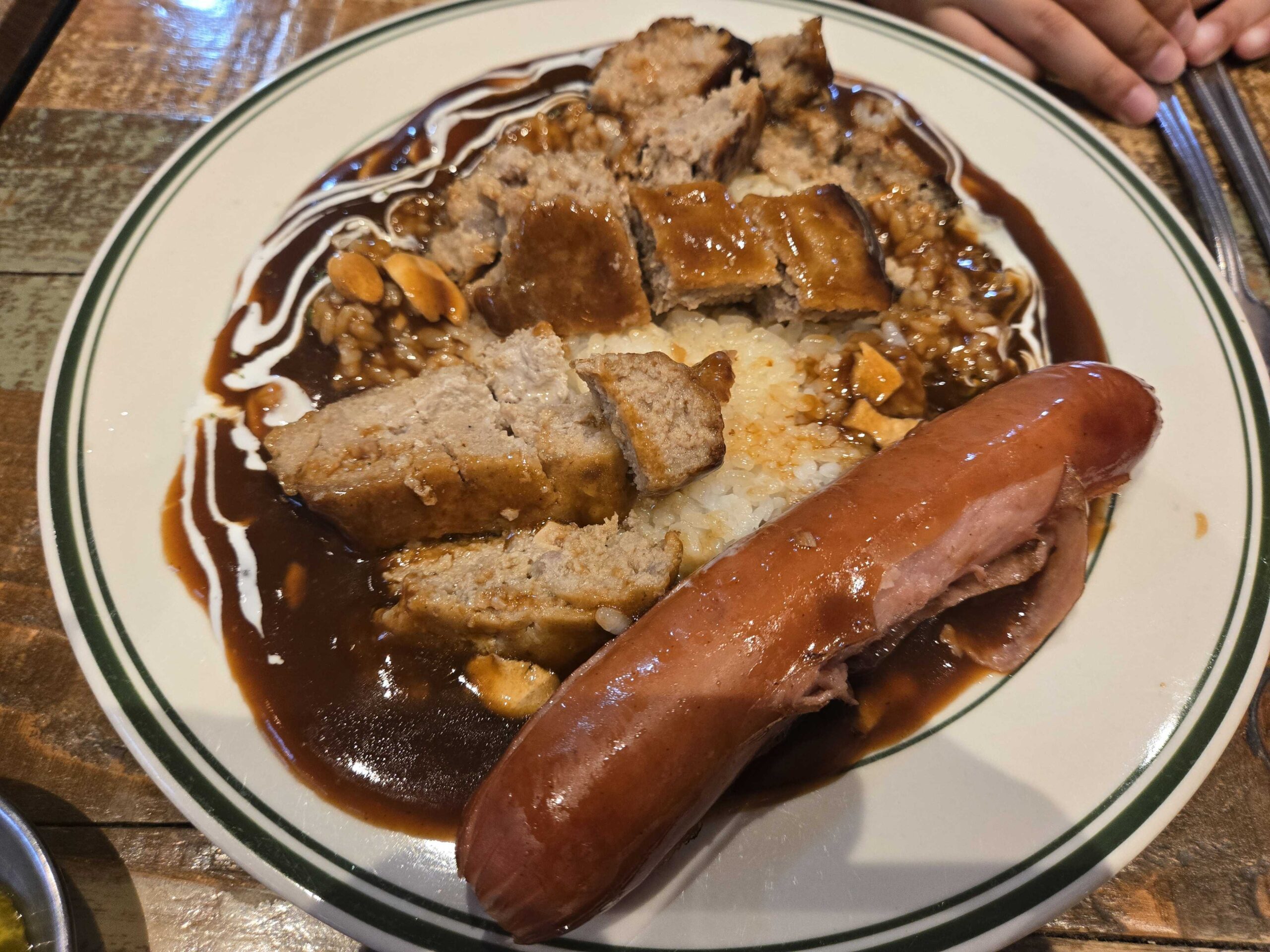 Classic hambak beef patty close up with brown sauce Pildong Hambak
