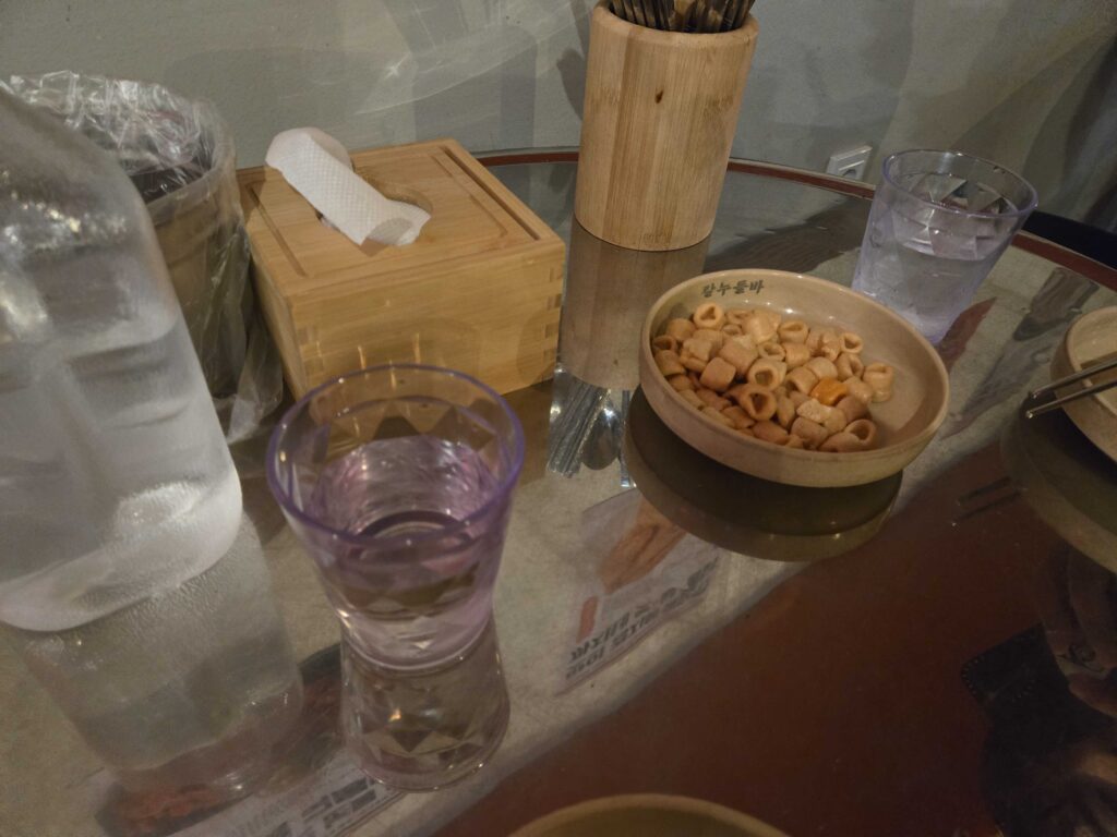 Table setup with snacks and chopsticks at Kkachine Kondae