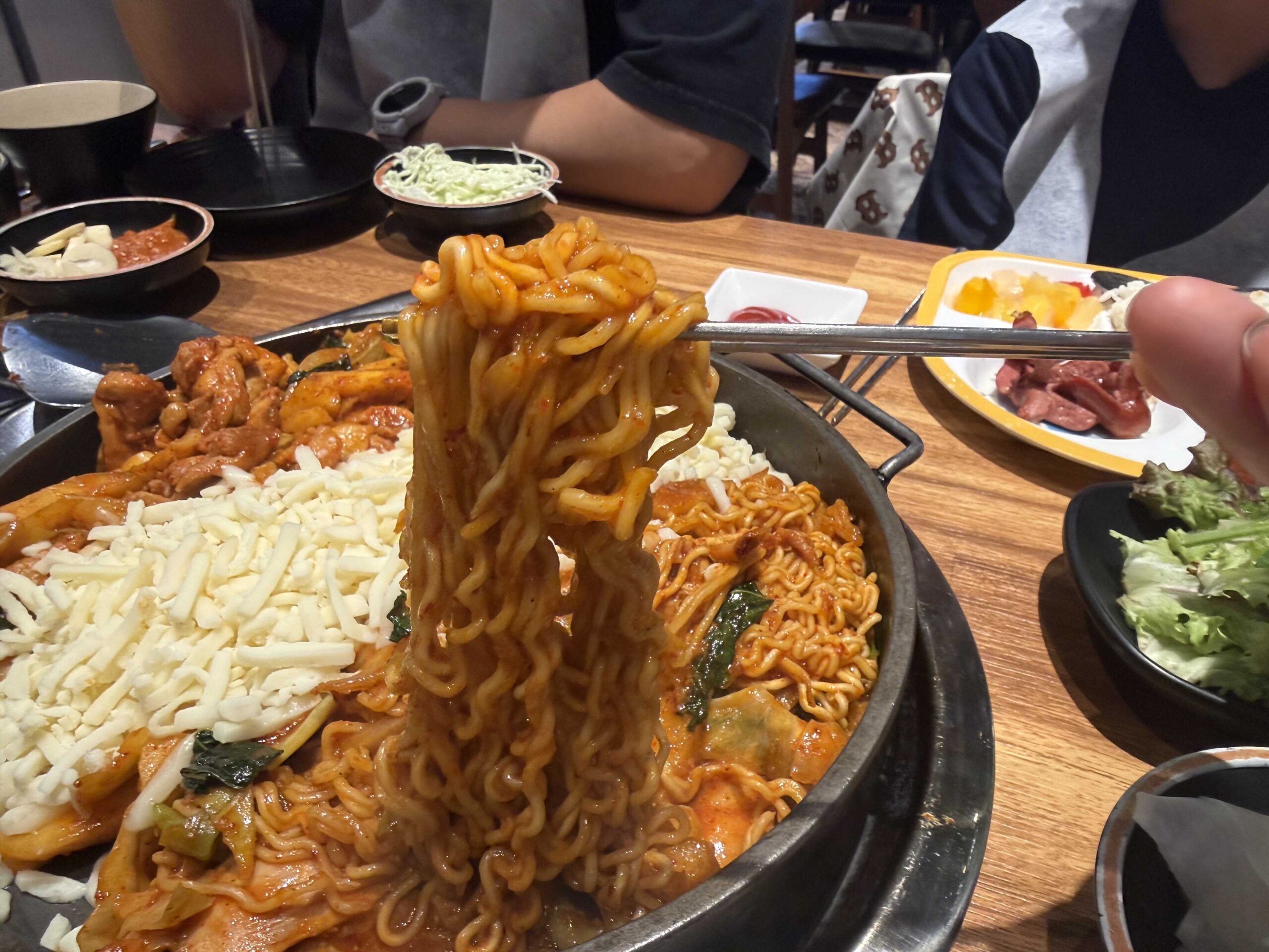 Biwabyul Dakgalbi Wirye cheese dakgalbi melted mozzarella pull shot