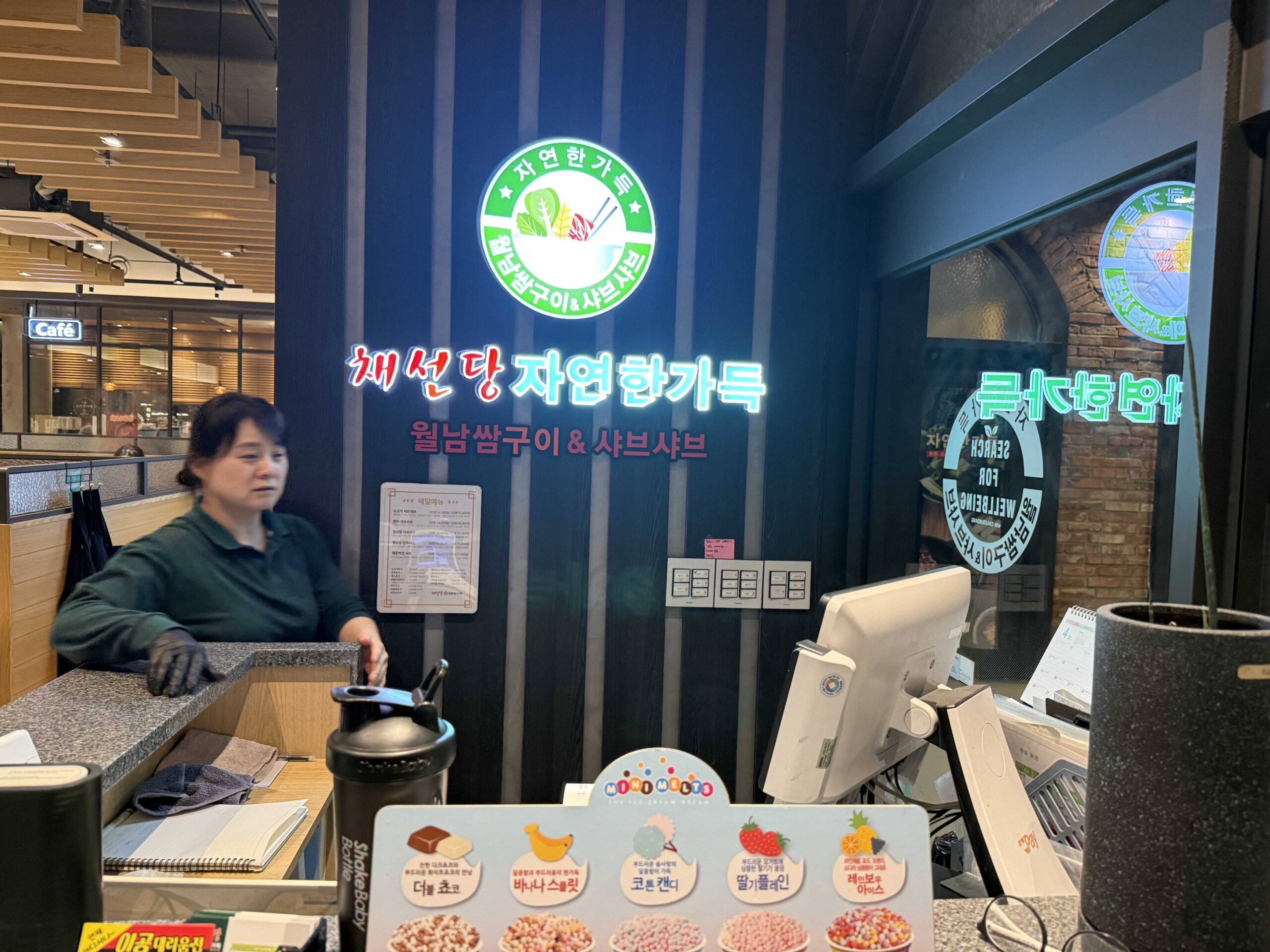 Chaesundang Hanam Misa front counter with neon sign