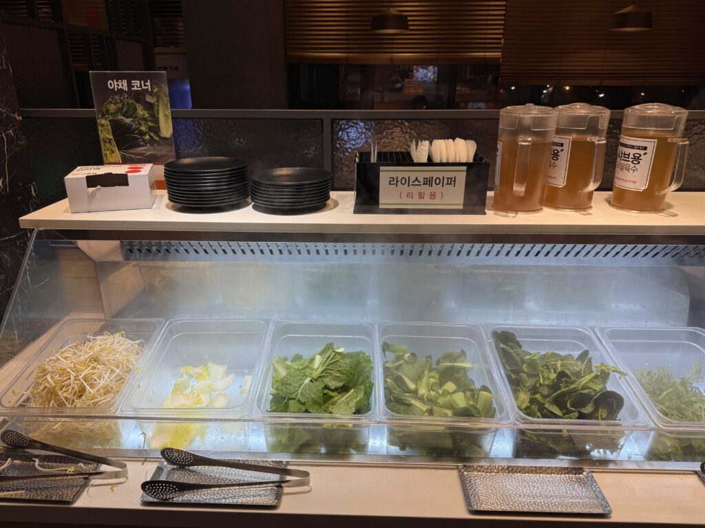 Vegetables and greens at the self-service bar