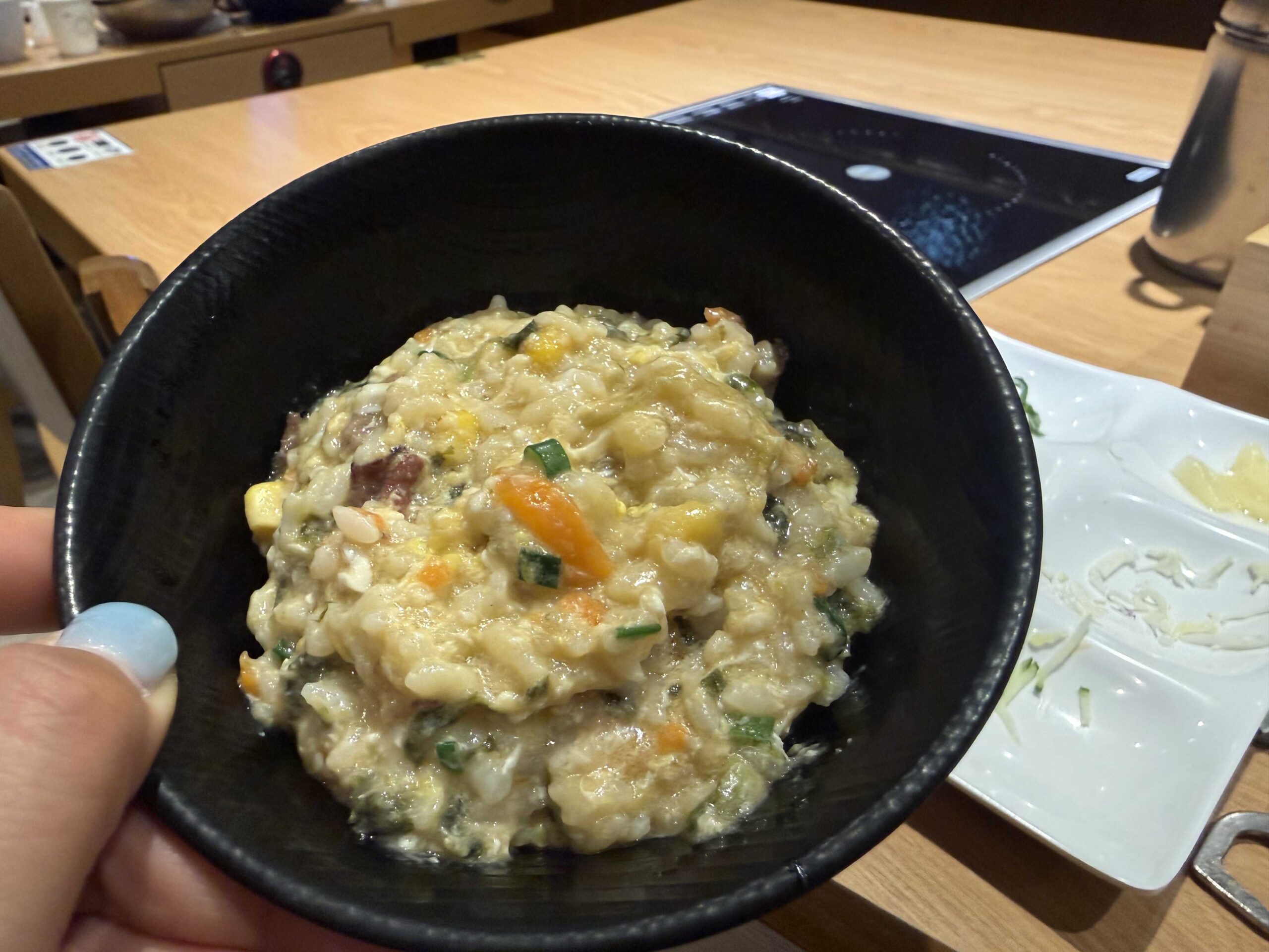 Rice porridge juk at Chaesundang Hanam Misa shabu-shabu