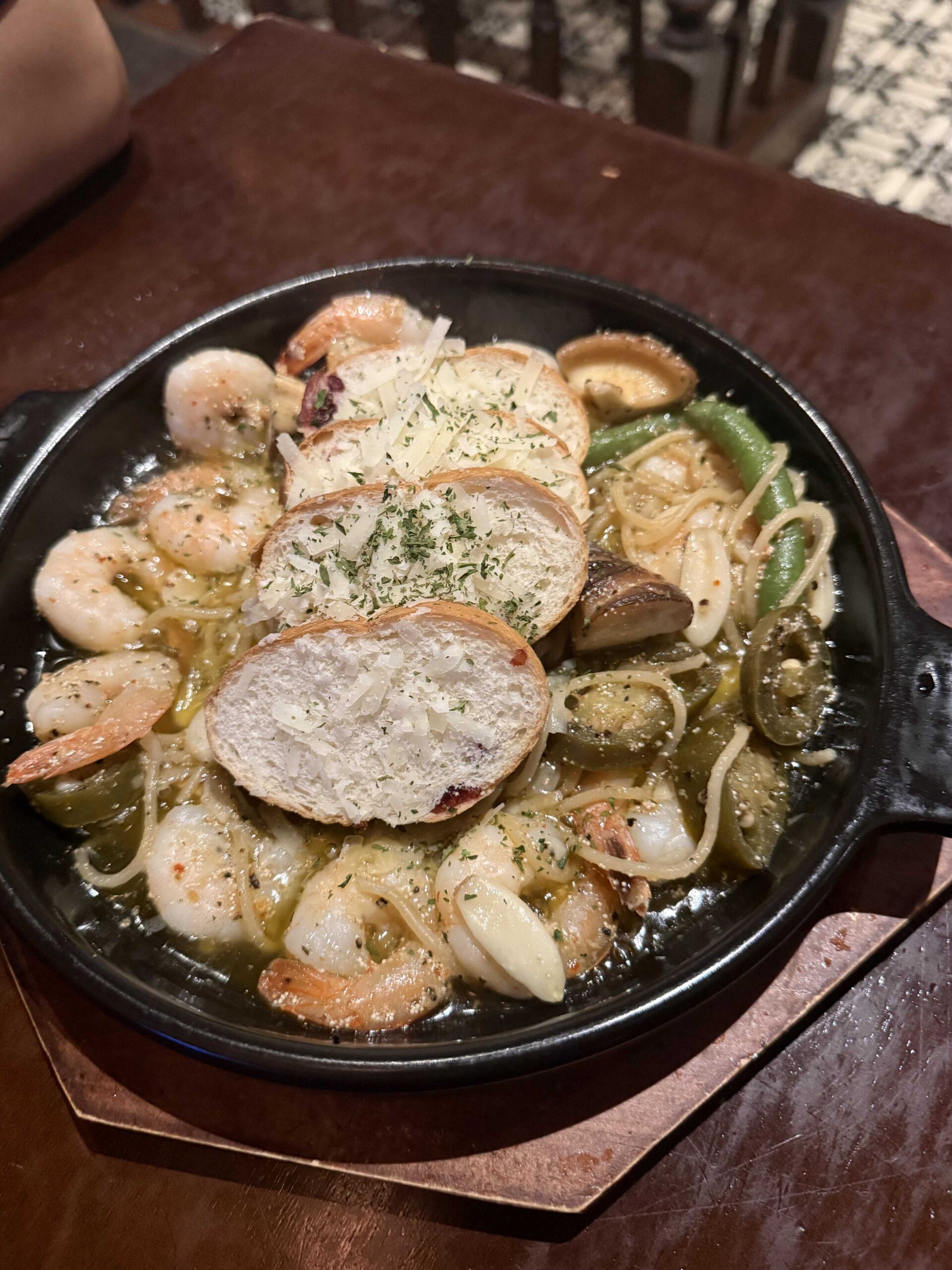 Samonim gambas with shrimp garlic jalapeno baguette and parmesan at Geumbyeol Maekju Bangi