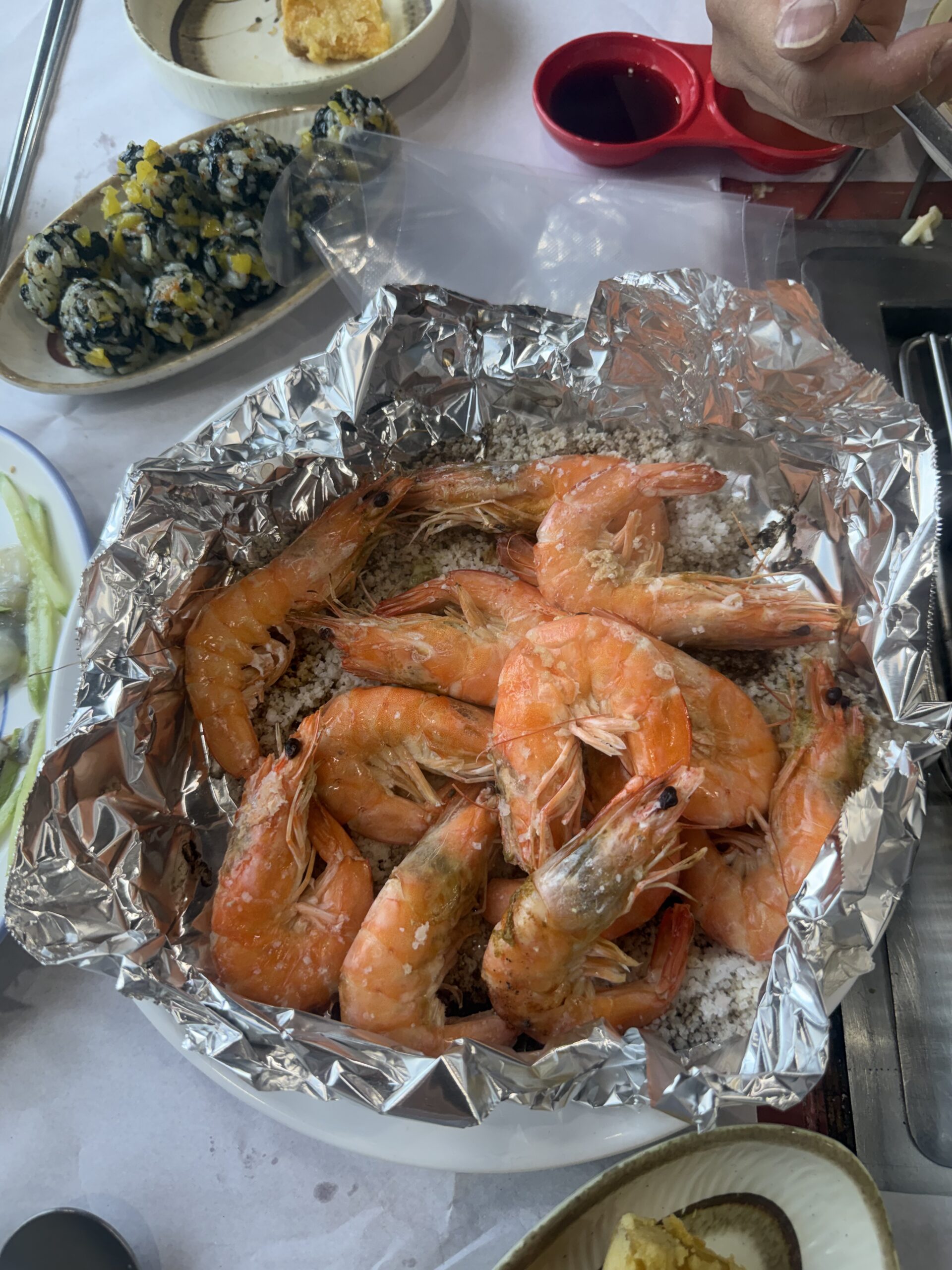 King prawn close-up cooked on the grill for Anmyeondo grilled clams meal