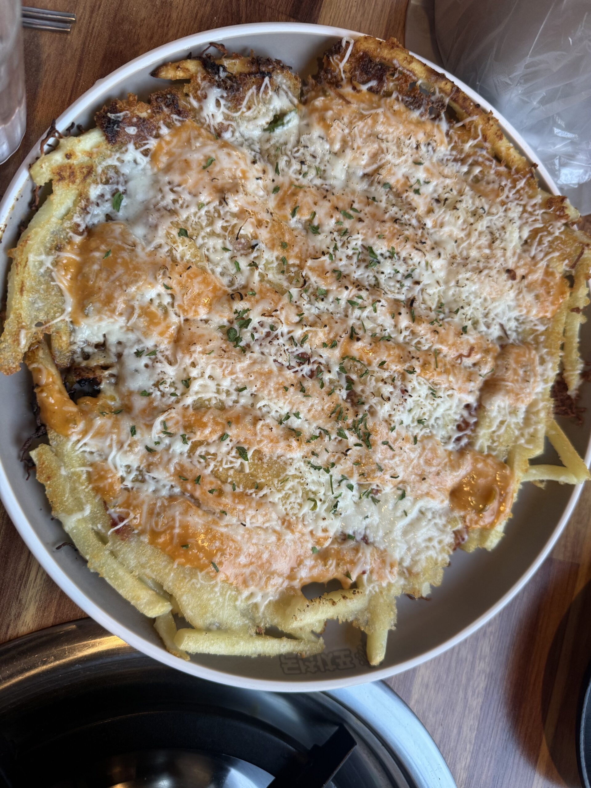Cheese-topped gamjajeon Korean potato pancake at Pocha Cheonguk Hanam
