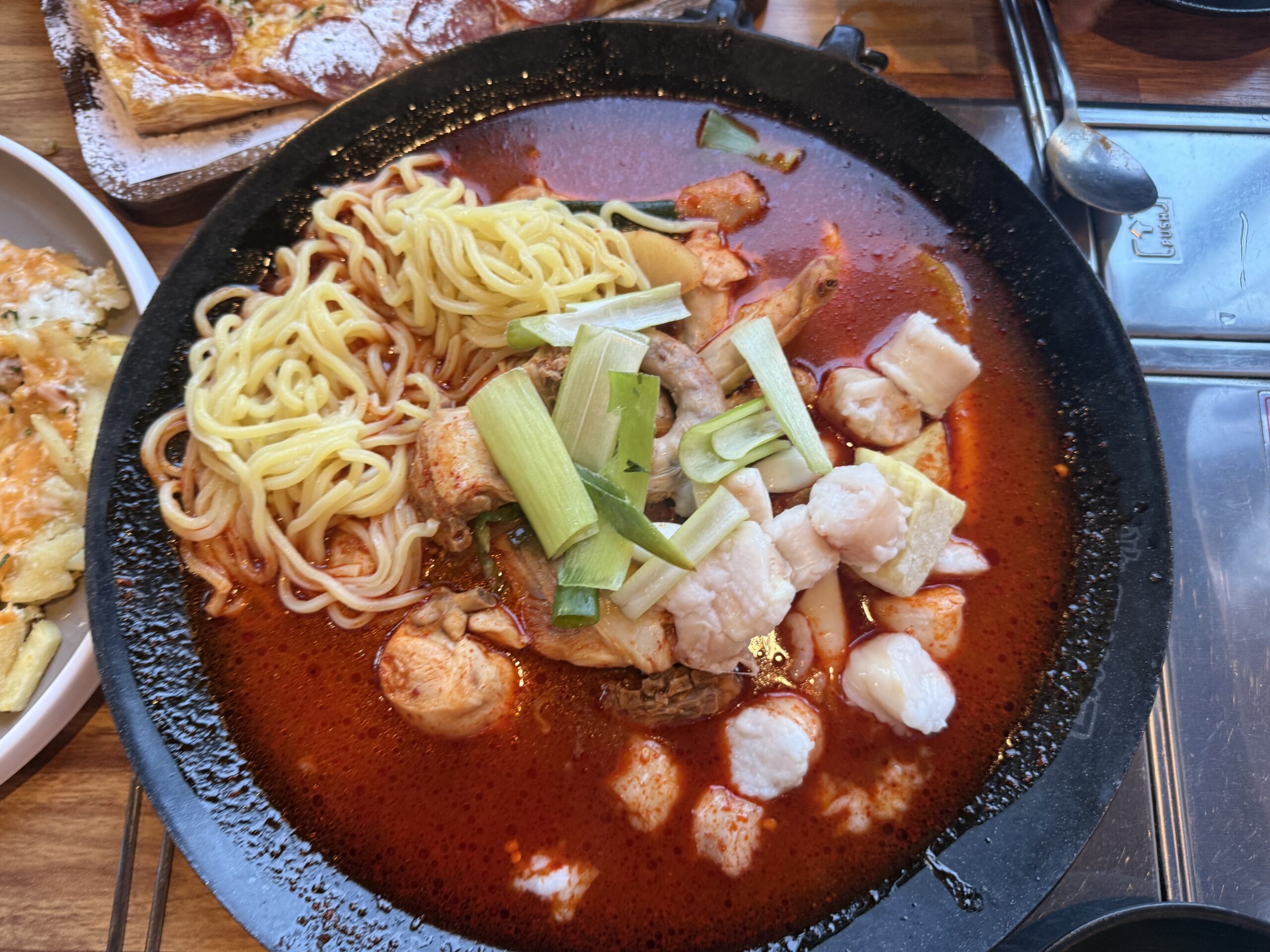 Rectangular pepperoni pizza with sugar dust at Pocha Cheonguk Hanam