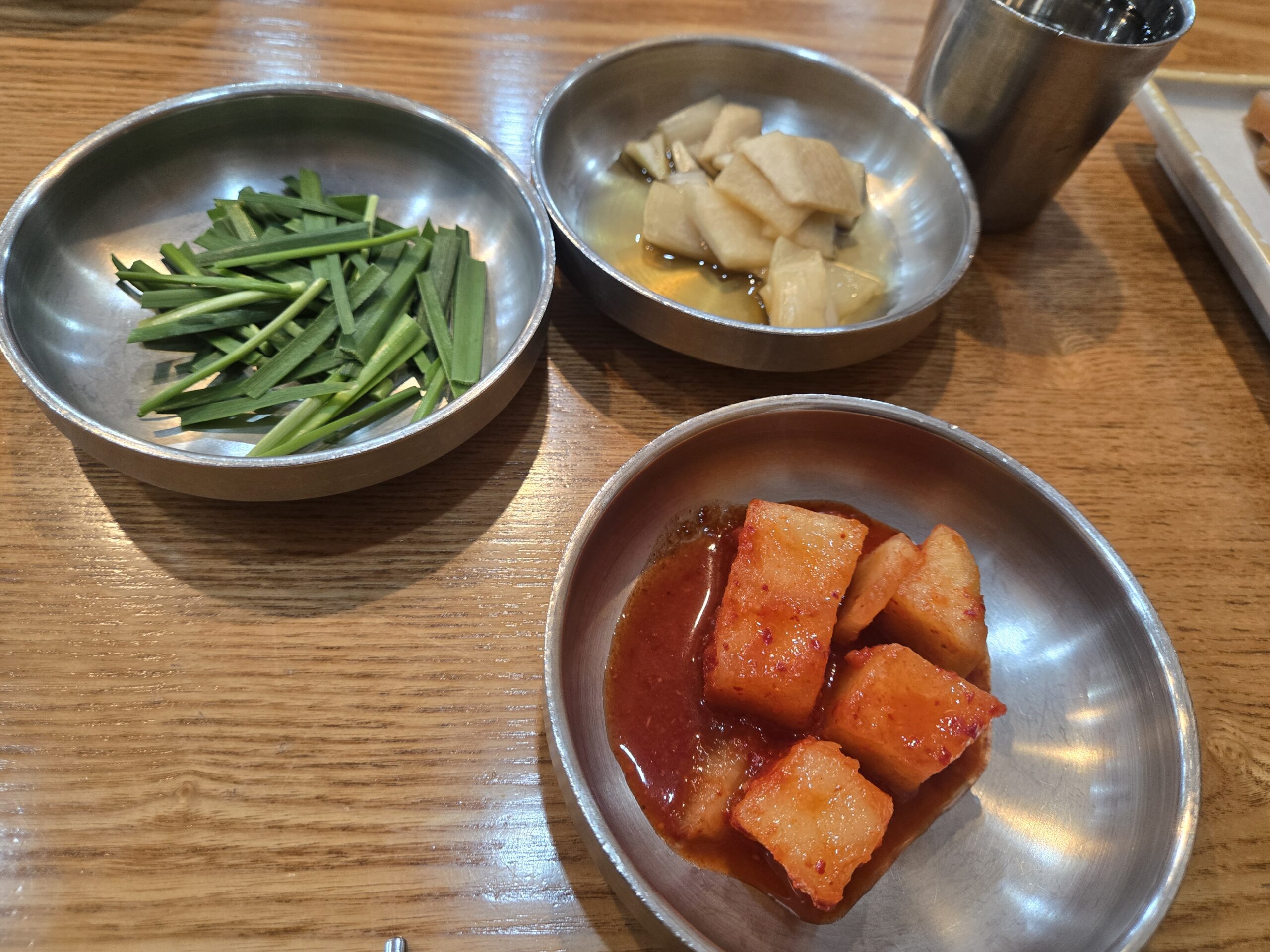 Korean banchan side dishes chives pickled radish at Dammion Seongsu