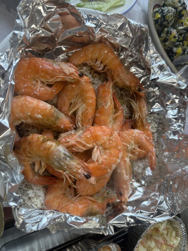 King prawns cooking in foil