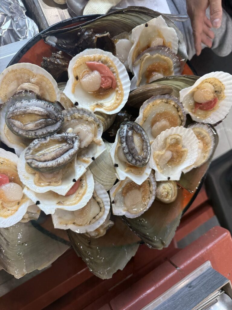 Scallops, abalone and other shellfish ready for the grill