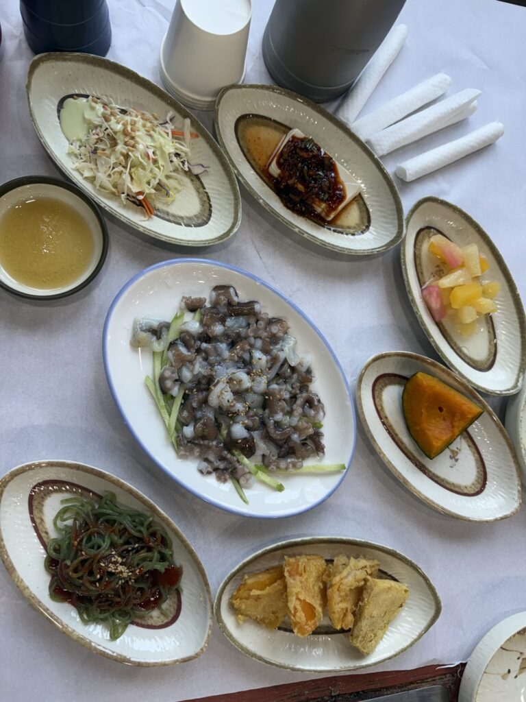 The side dishes around the octopus plate