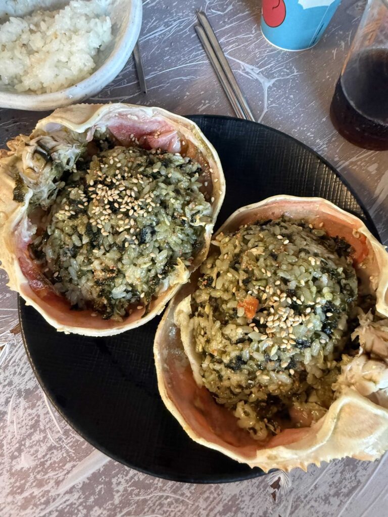 Crab-shell fried rice topped with sesame seeds