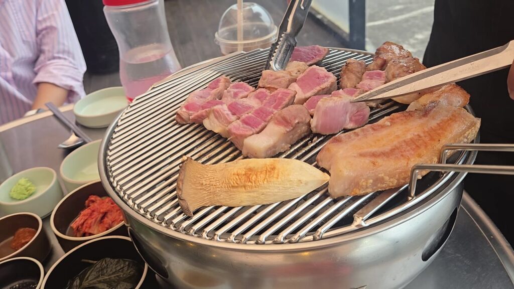 Black pork and king oyster mushroom on the grill